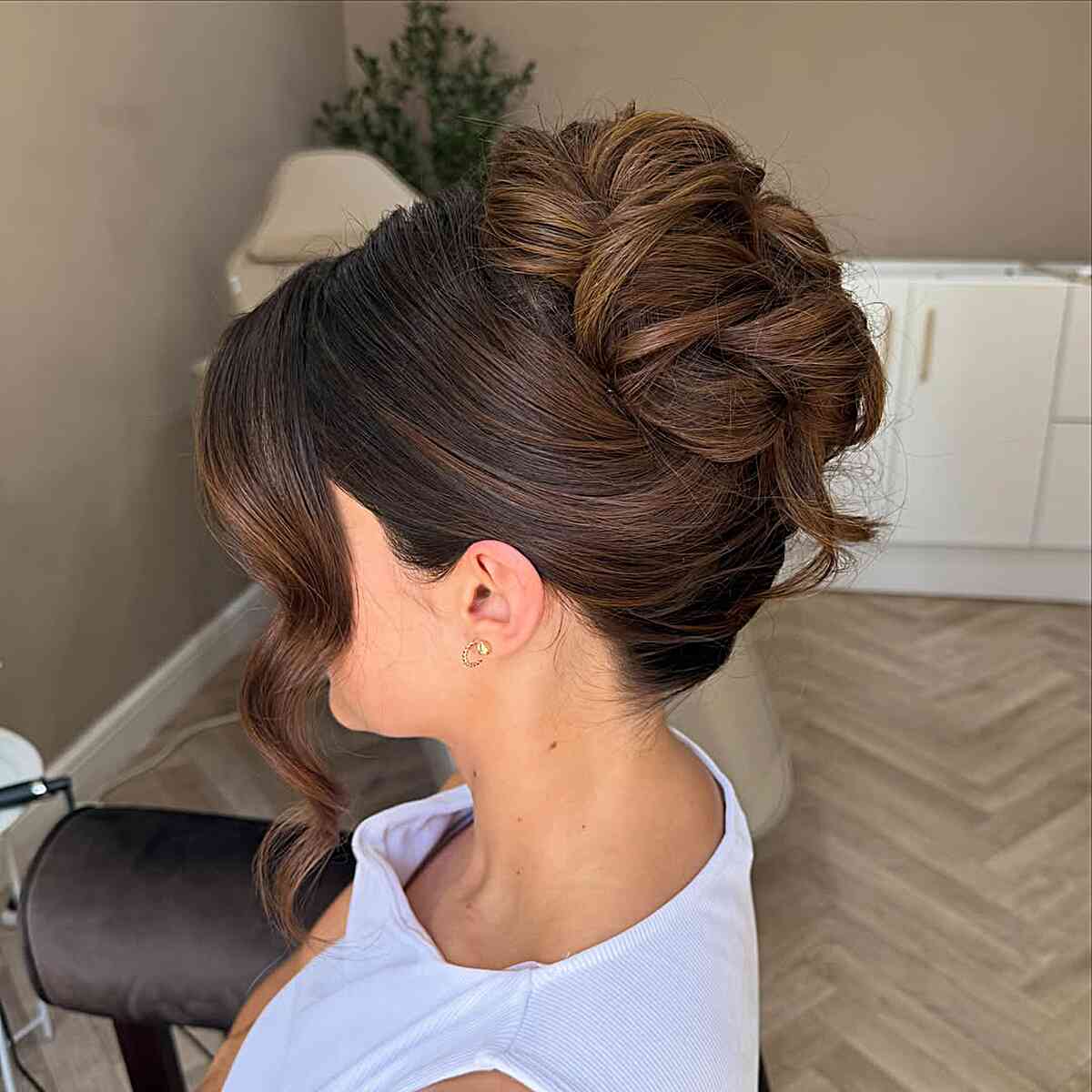 Dark Brown Voluminous Twisted Updo Dark Brown Voluminous Twisted Updo — Trendy Wedding Guest Updos