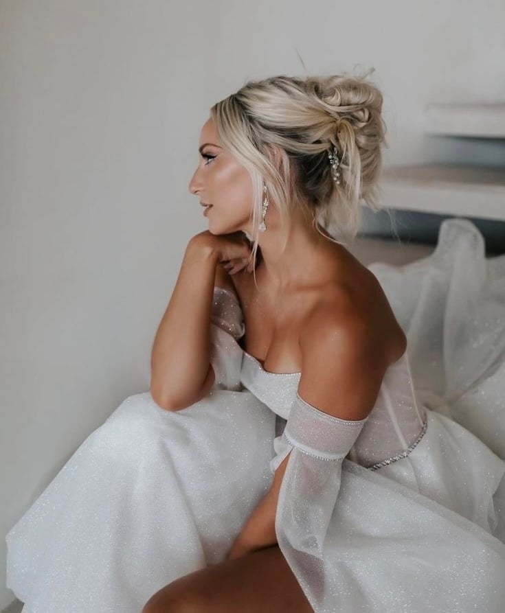 Ash Blonde Messy Updo With Wispy Bangs — Trendy Wedding Hair