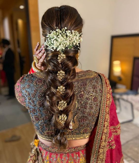 Dark Brown Waterfall Braid With Flowers — Trendy Wedding Hair