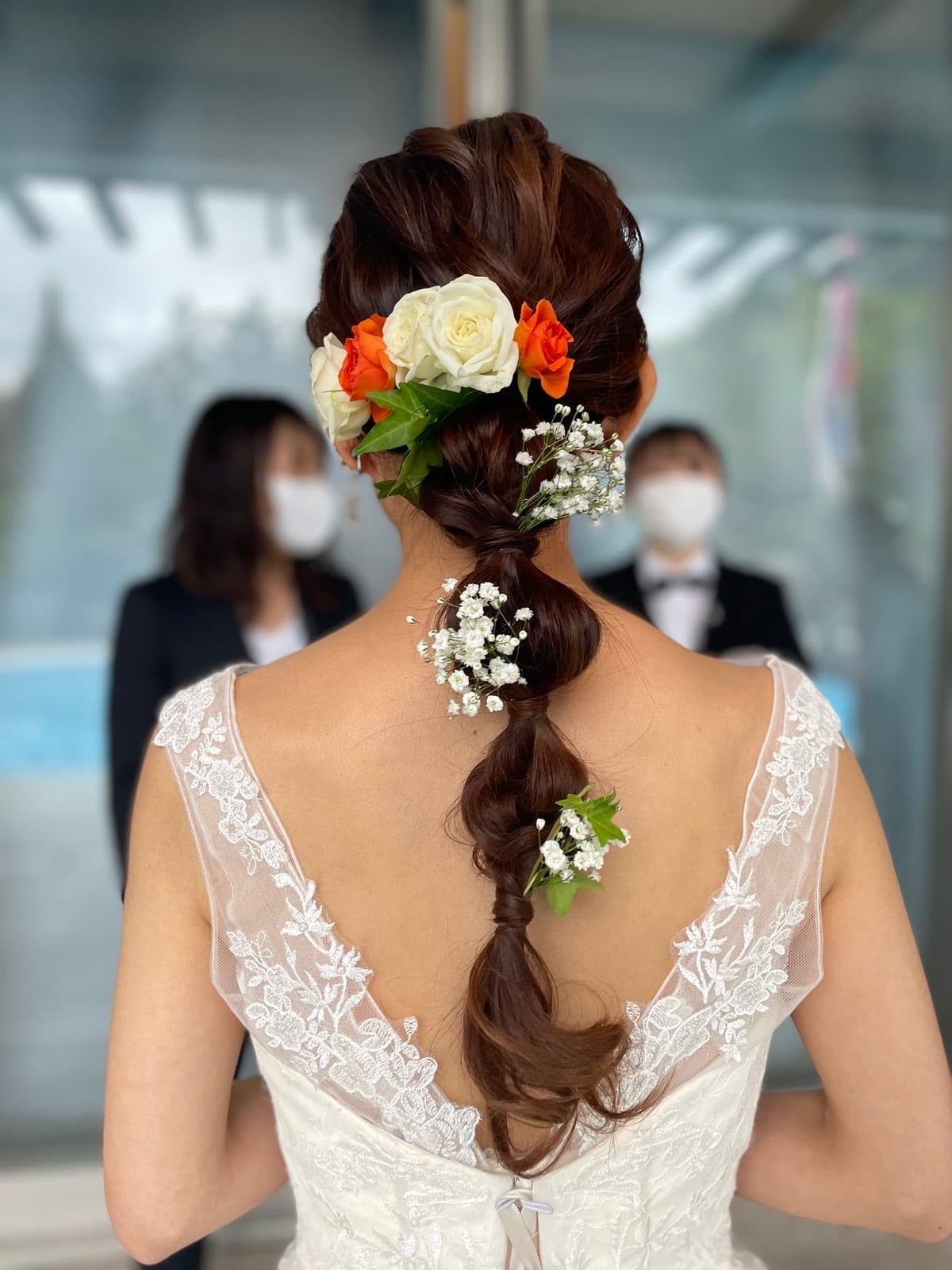 Textured Dark Brown Updo With Flowers, Mid-Back — Trendy Wedding Hair