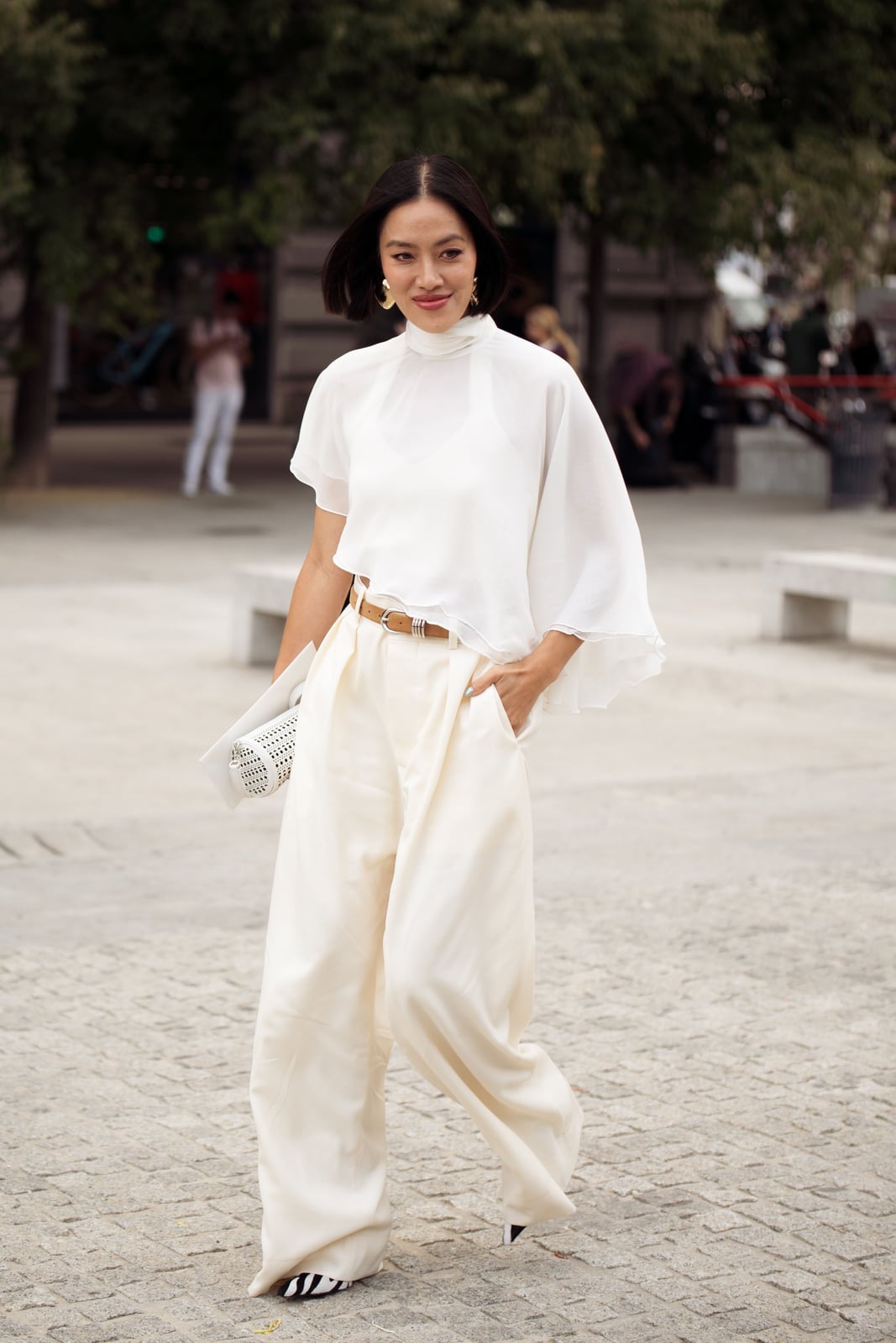 Dramatic Sleeves Elevate White Shirt and Cream Trousers — Trendy White Shirt Outfits