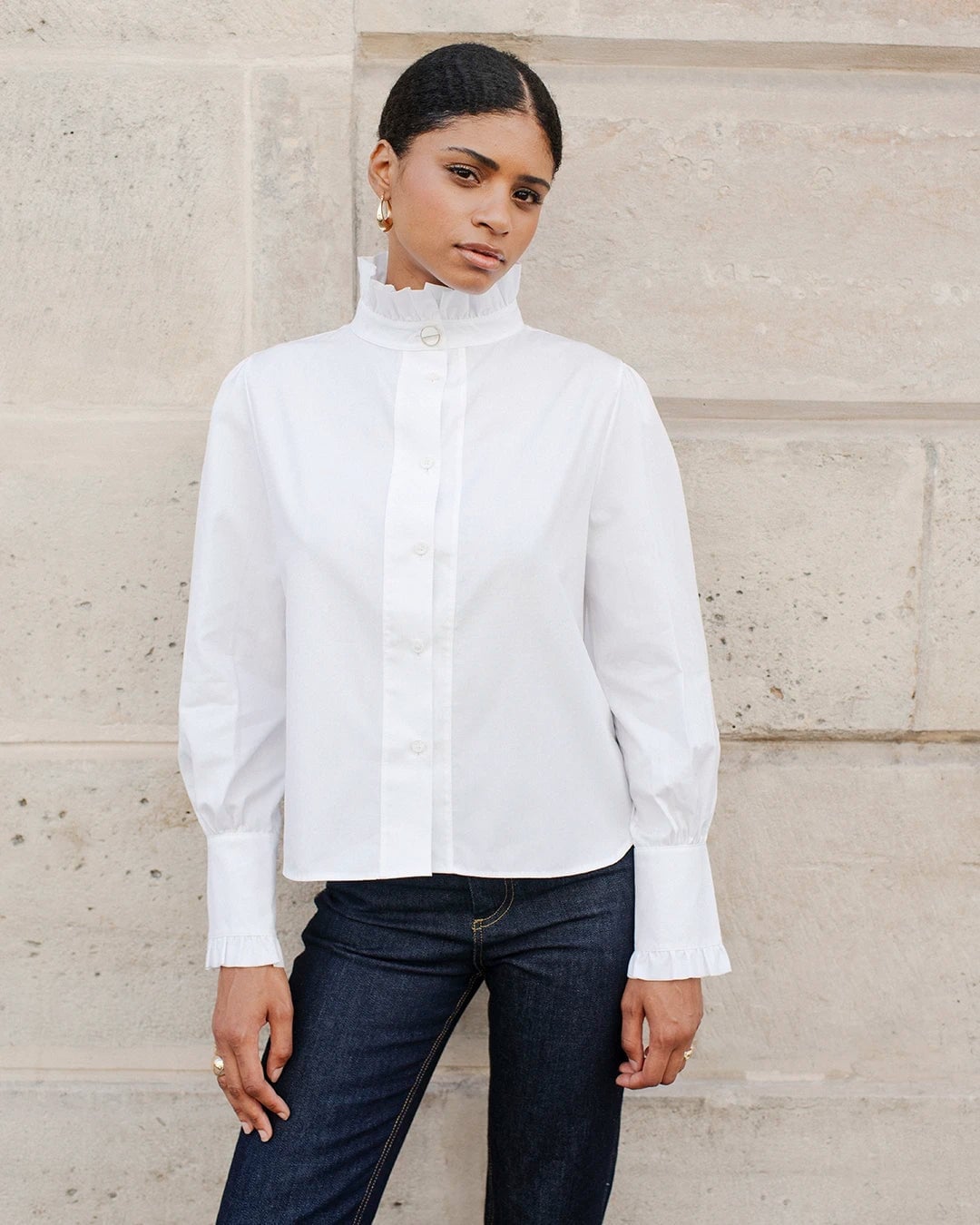 Ruffled High-Neck White Shirt with Dark Wash Jeans — Trendy White Shirt Outfits