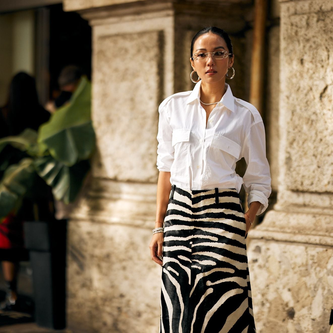 Crisp White Shirt Meets Bold Zebra Print Skirt — Trendy White Shirt Outfits
