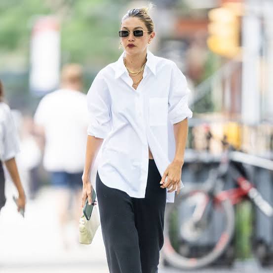 Oversized White Button-Down Shirt and Black Pants for Casual Chic — Trendy White Shirt Outfits