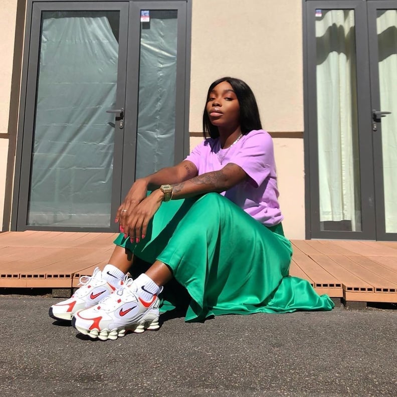 White and Red Sneakers With Purple T-shirt and Green Satin Skirt White and Red Sneakers With Purple T-shirt and Green Satin Skirt — Trendy White Sneakers Outfits
