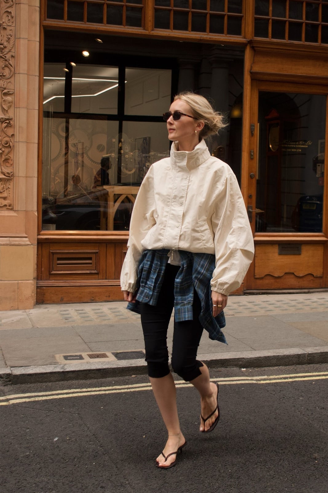 Oversized Cream Windbreaker with Plaid Shirt at Waist — Trendy Windbreaker Outfits
