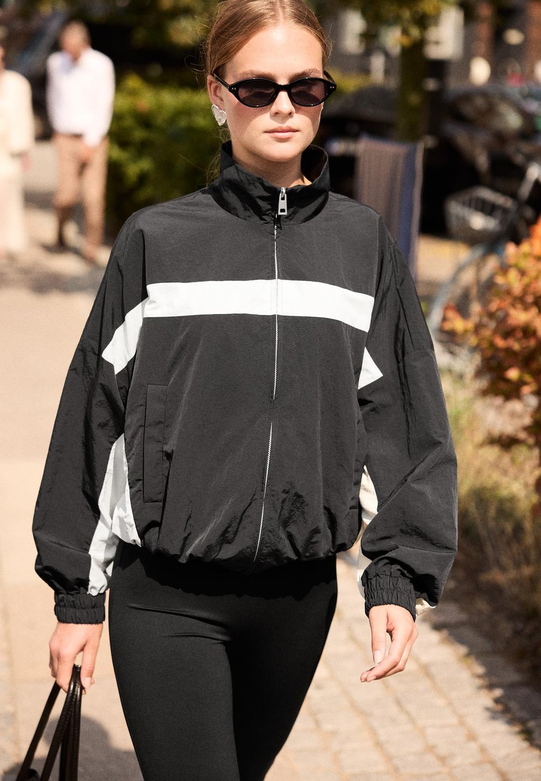 Black and White Striped Windbreaker with Leggings — Trendy Windbreaker Outfits