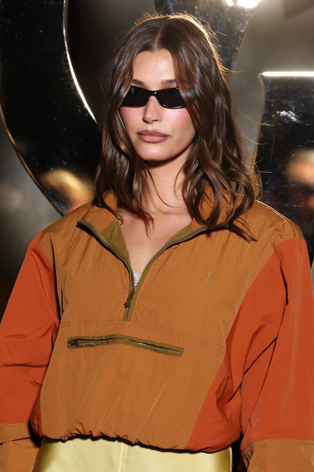 Cropped Orange and Brown Half-Zip Windbreaker, Close-Up Take — Trendy Windbreaker Outfits