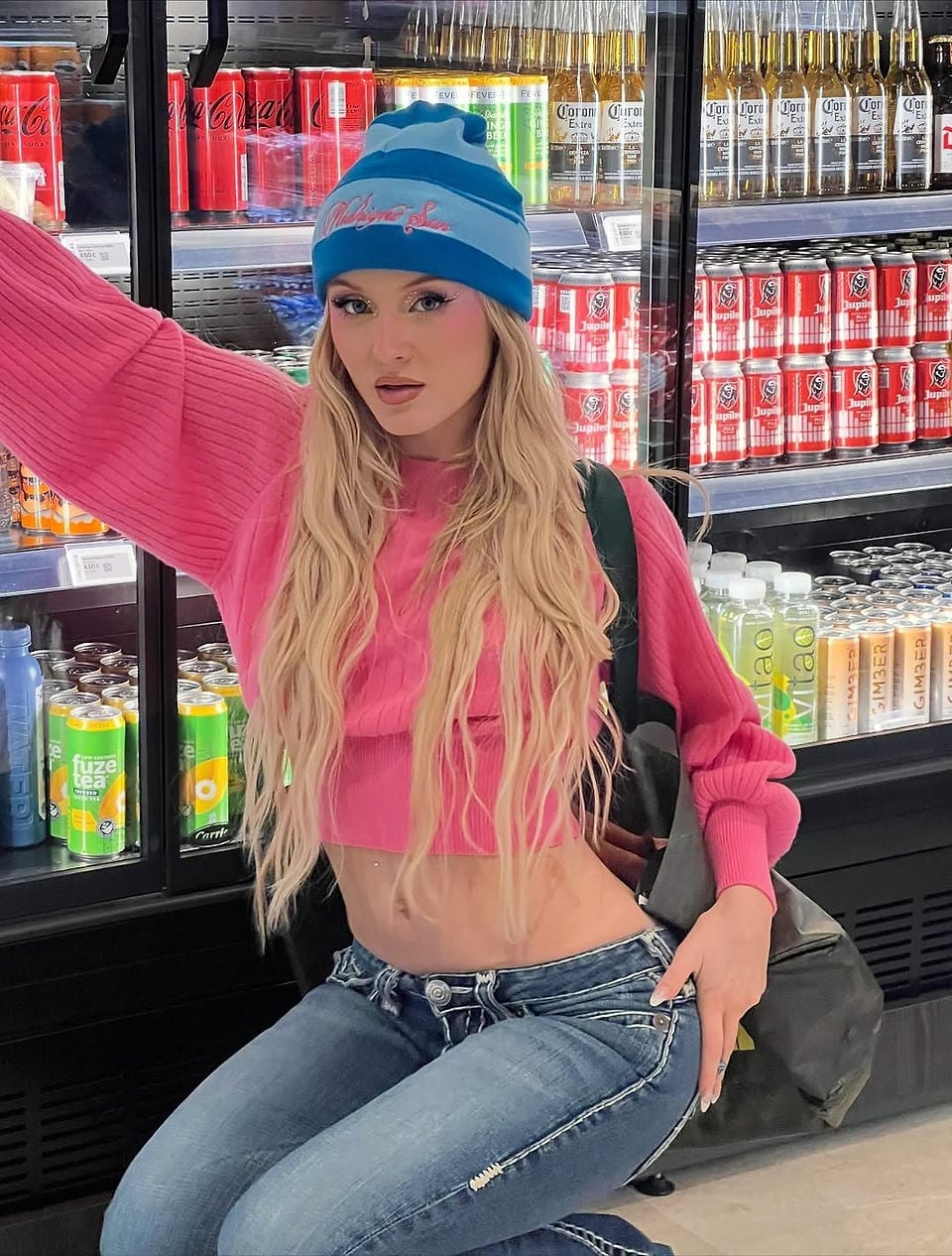 Bright Pink Cropped Sweater with Low-Rise Jeans — Trendy Zara Larsson Outfits