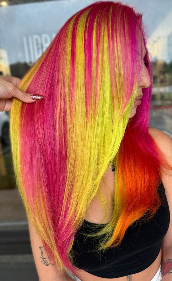 Mid-Back Neon Streaks and Orange Ends — Vivid Hair Color Inspiration