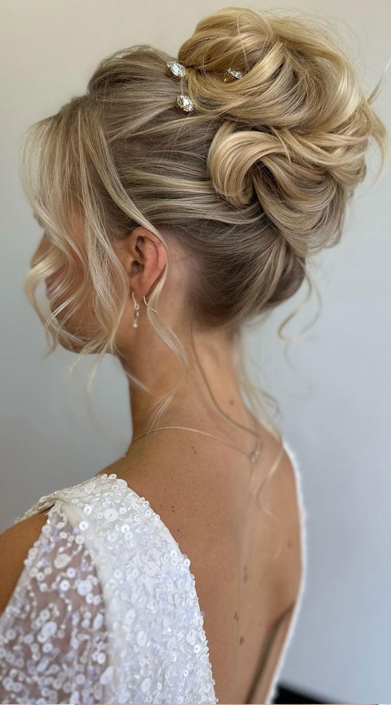 Voluminous Ash Blonde Sculpted Bun Voluminous Ash Blonde Sculpted Bun — Wedding Bun Ideas