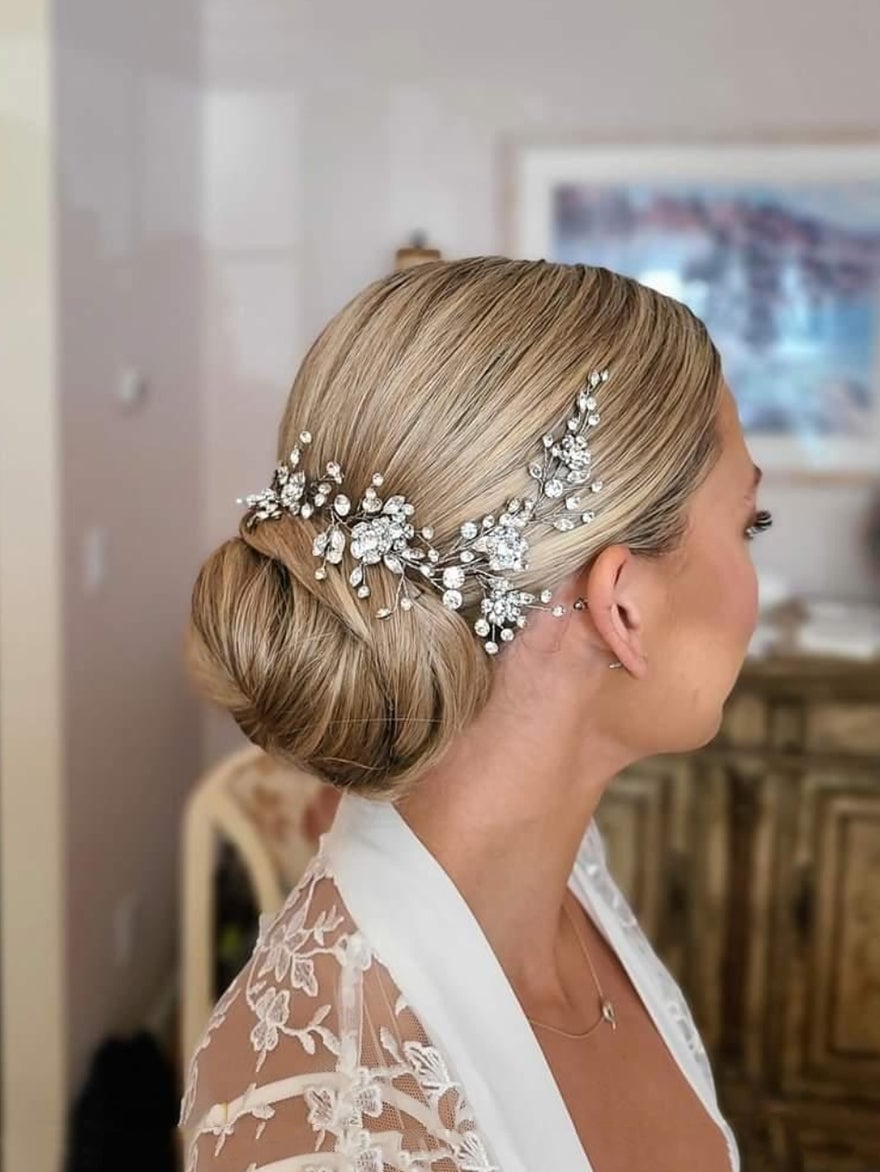 Sleek Blonde Low Bun With Hairpiece Sleek Blonde Low Bun With Hairpiece — Wedding Bun Ideas
