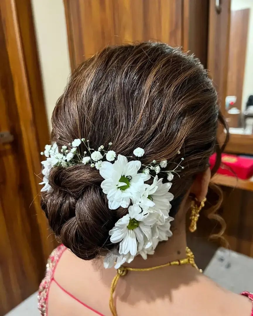 Dark Brown Bun With Large White Flowers Dark Brown Bun With Large White Flowers — Wedding Bun Ideas