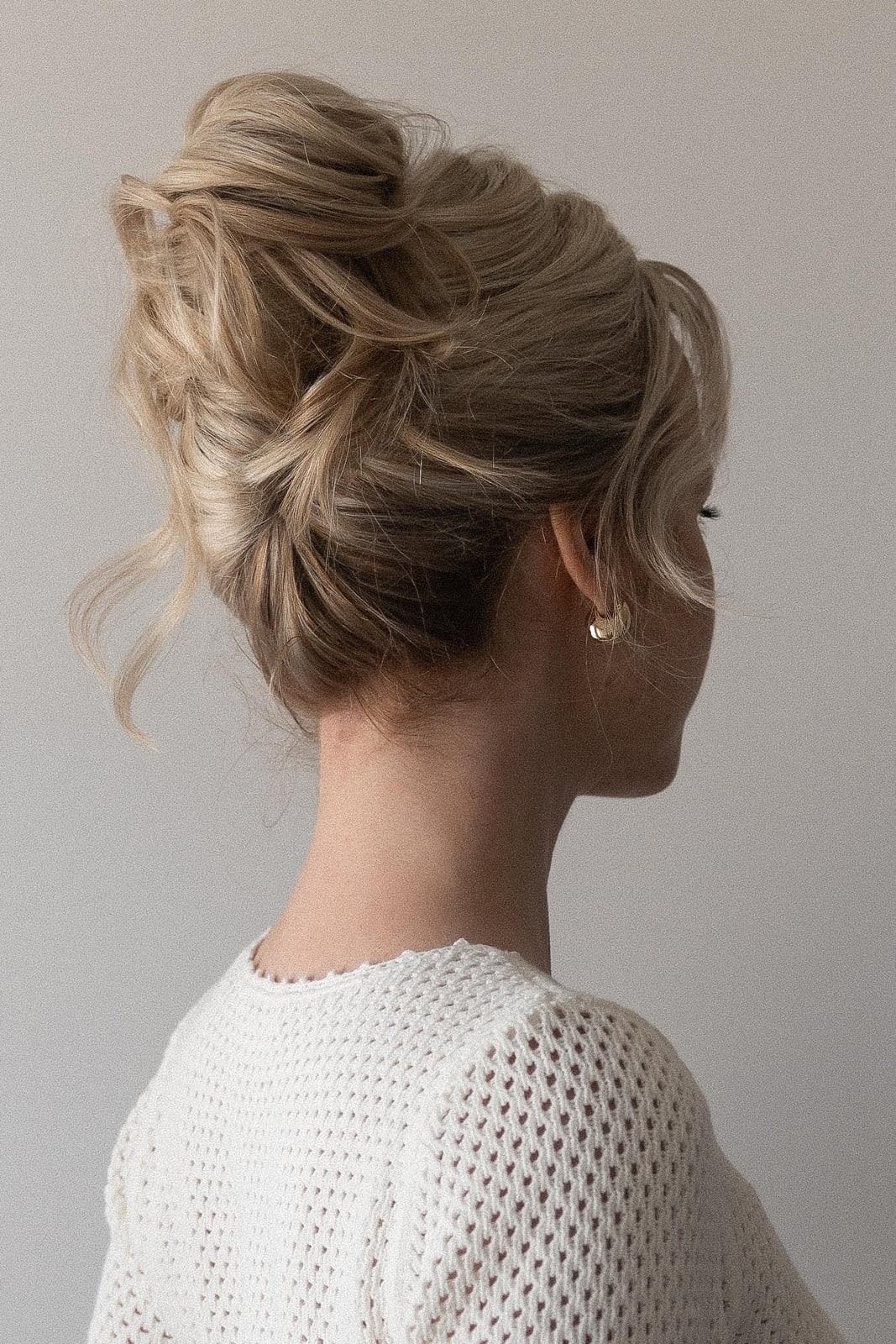 Voluminous Ash Blonde Textured High Bun Voluminous Ash Blonde Textured High Bun — Wedding Bun Ideas